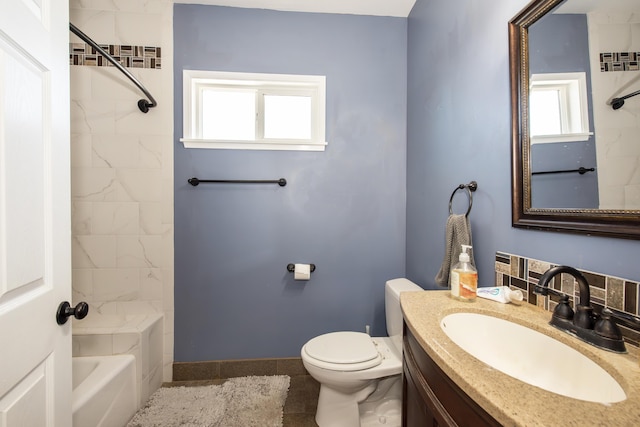 3933 Foothill Rd, Santa Barbara, CA 93110 - bathroom featuring toilet, vanity, bathing tub / shower combination, and baseboards