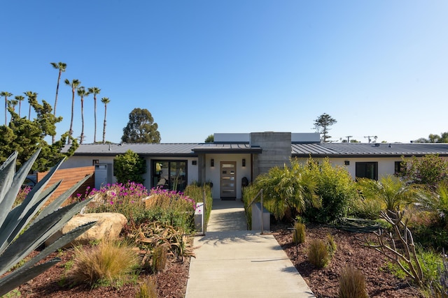 415 Yankee Farm Rd, Santa Barbara, CA 93109 - modern home featuring a standing seam roof, metal roof, and stucco siding