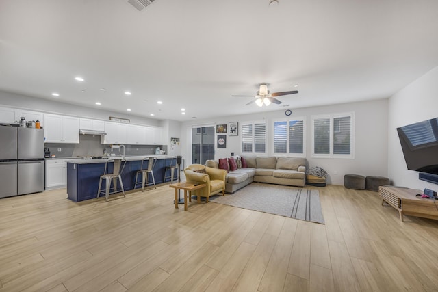 1010 Tranquillion Ct, Lompoc, CA 93436 - living room featuring ceiling fan, light wood-type flooring, and recessed lighting