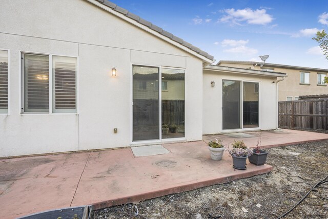 1010 Tranquillion Ct, Lompoc, CA 93436 - back of house featuring a patio area, fence, and stucco siding