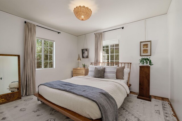 bedroom featuring light wood finished floors