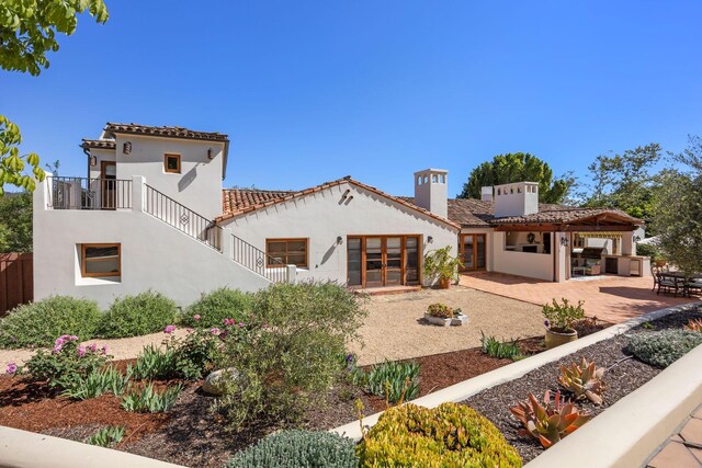 10971 Alto Ct, Oak View, CA 93022 - back of house featuring french doors, a chimney, stucco siding, a patio area, and a tiled roof