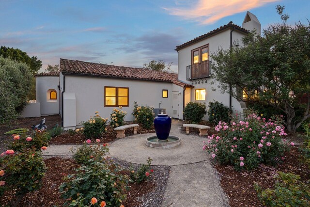 10971 Alto Ct, Oak View, CA 93022 - back of property featuring a tile roof, a balcony, stucco siding, central air condition unit, and a patio