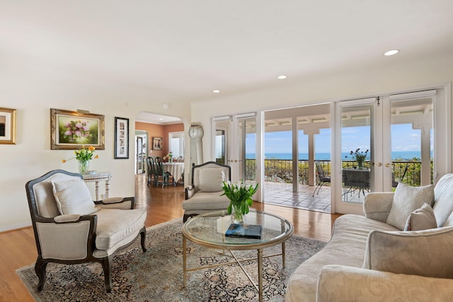 170 Loma Media Rd, Santa Barbara, CA 93103 - living area with french doors, plenty of natural light, wood finished floors, and recessed lighting