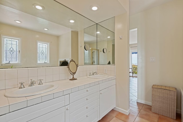 170 Loma Media Rd, Santa Barbara, CA 93103 - bathroom featuring double vanity, tile patterned floors, decorative backsplash, and recessed lighting