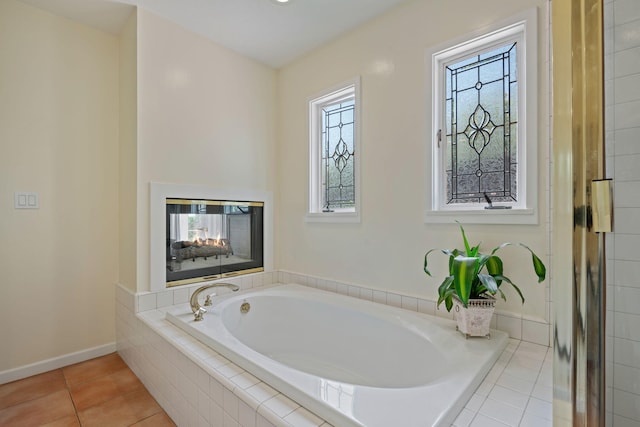 170 Loma Media Rd, Santa Barbara, CA 93103 - bathroom with a garden tub and tile patterned flooring