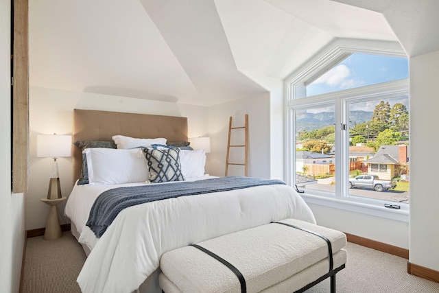 5529 Calle Arena, Carpinteria, CA 93013 - carpeted bedroom featuring baseboards and vaulted ceiling