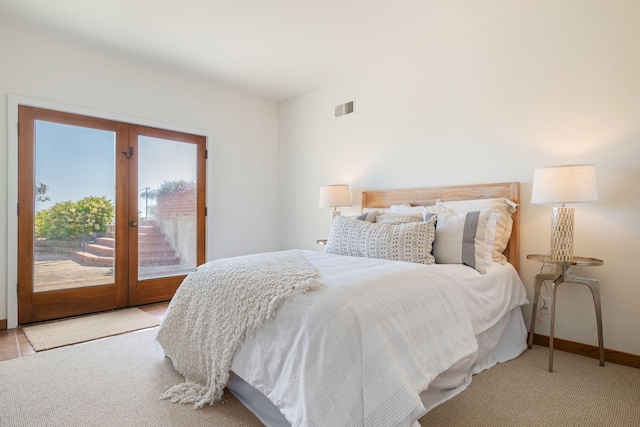 5529 Calle Arena, Carpinteria, CA 93013 - bedroom featuring access to outside, french doors, baseboards, and carpet