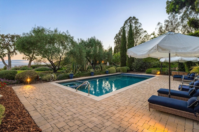 7200 Casitas Pass Rd, Carpinteria, CA 93103 - pool at dusk with a patio area and an outdoor pool
