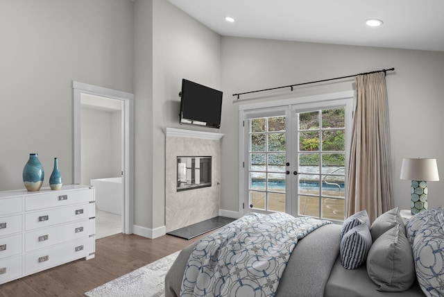 919 Aleeda Ln, Santa Barbara, CA 93108 - bedroom featuring access to exterior, high vaulted ceiling, dark wood finished floors, baseboards, and french doors