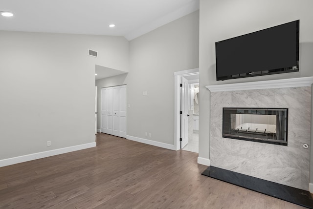 919 Aleeda Ln, Santa Barbara, CA 93108 - unfurnished living room with baseboards, wood finished floors, a fireplace, high vaulted ceiling, and recessed lighting