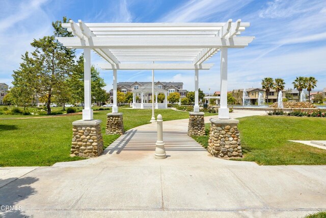 714 Nile River Dr, Oxnard, CA 93036 - view of property's community with a pergola, a lawn, and a residential view