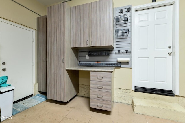 714 Nile River Dr, Oxnard, CA 93036 - kitchen with light tile patterned flooring and light brown cabinetry