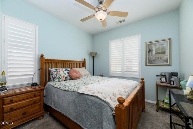 714 Nile River Dr, Oxnard, CA 93036 - carpeted bedroom with baseboards and a ceiling fan