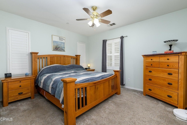 714 Nile River Dr, Oxnard, CA 93036 - bedroom with light carpet, a ceiling fan, and baseboards