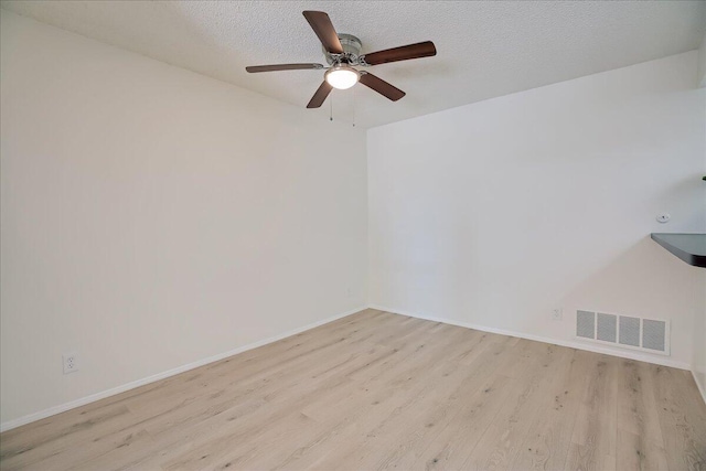 232 Rosewood St, Ventura, CA 93001 - empty room featuring wood finished floors, ceiling fan, a textured ceiling, and baseboards