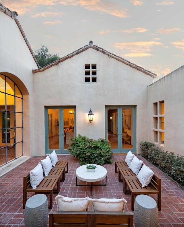 603 Juan Crespi Ln, Montecito, CA 93108 - patio terrace at dusk with french doors, outdoor lounge area, and a patio