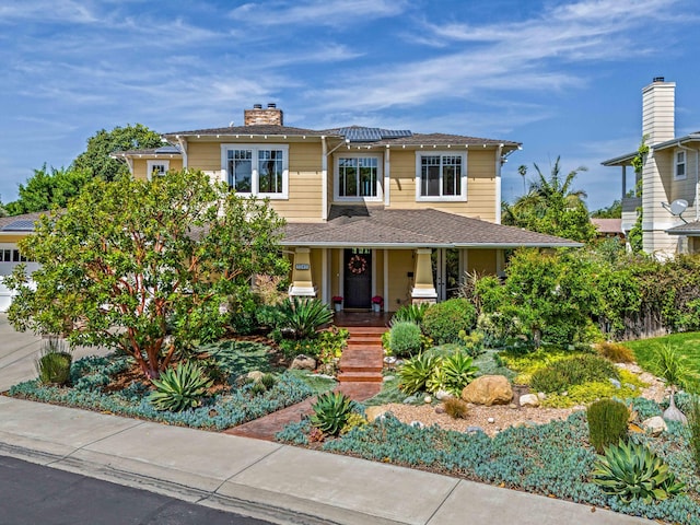 5049 Via Lara Ln, Santa Barbara, CA 93111 - view of front of house featuring a porch and a chimney