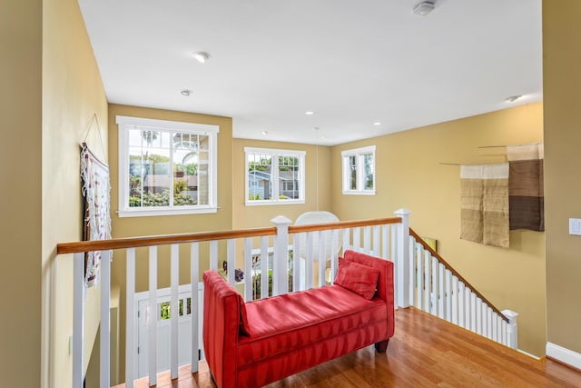 5049 Via Lara Ln, Santa Barbara, CA 93111 - living area featuring wood finished floors, baseboards, an upstairs landing, and recessed lighting