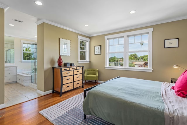 5049 Via Lara Ln, Santa Barbara, CA 93111 - bedroom with crown molding, recessed lighting, wood finished floors, baseboards, and ensuite bath