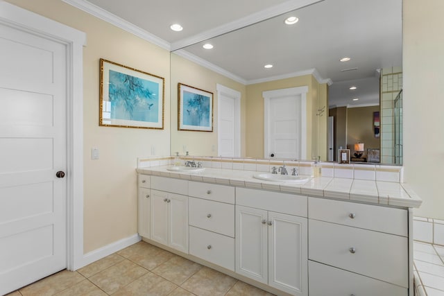 5049 Via Lara Ln, Santa Barbara, CA 93111 - full bath featuring ornamental molding, double vanity, tile patterned flooring, baseboards, and recessed lighting
