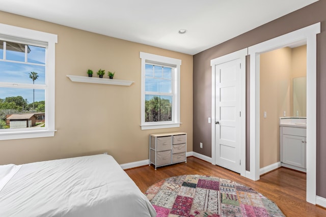 5049 Via Lara Ln, Santa Barbara, CA 93111 - bedroom with wood finished floors, baseboards, and recessed lighting