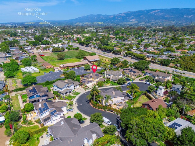 5049 Via Lara Ln, Santa Barbara, CA 93111 - aerial view of property and surrounding area with a mountainous background and nearby suburban area