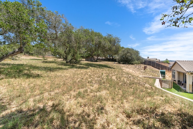 view of yard with fence