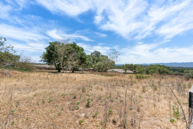 view of undeveloped land featuring rural landscape
