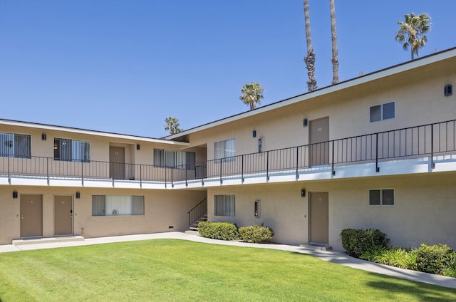 560 W Gonzales Rd, Oxnard, CA 93030 - view of property featuring stairs