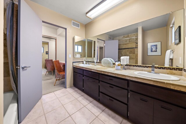 840 Cheltenham Rd, Santa Barbara, CA 93105 - full bath with a tile shower, tile patterned flooring, and double vanity