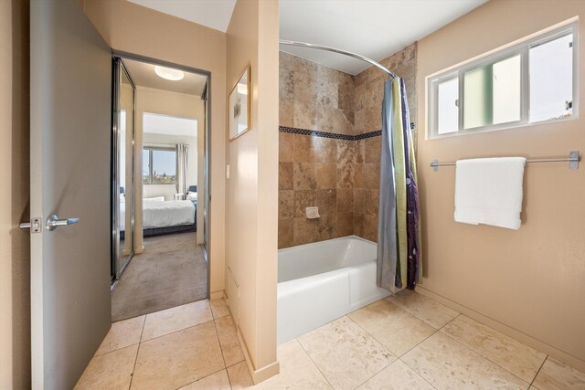 840 Cheltenham Rd, Santa Barbara, CA 93105 - bathroom featuring tile patterned flooring, shower / bath combination with curtain, baseboards, and ensuite bathroom
