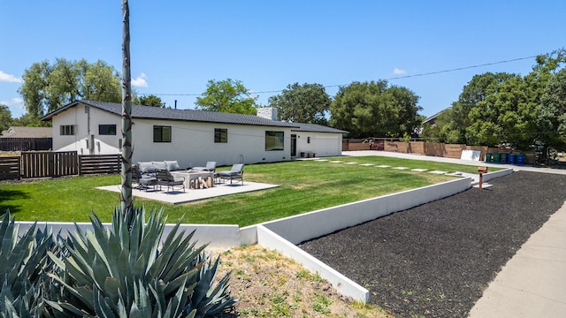1311 Meadowvale Rd, Santa Ynez, CA 93460 - rear view of property featuring a garage, a patio area, a chimney, stucco siding, and outdoor lounge area