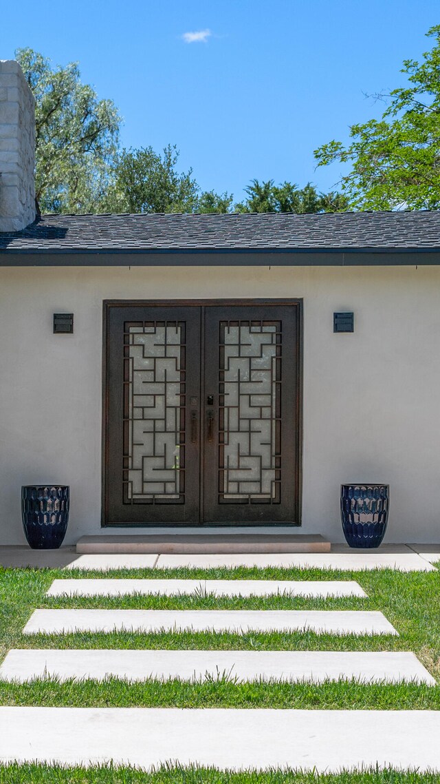 1311 Meadowvale Rd, Santa Ynez, CA 93460 - view of exterior entry featuring stucco siding and a chimney