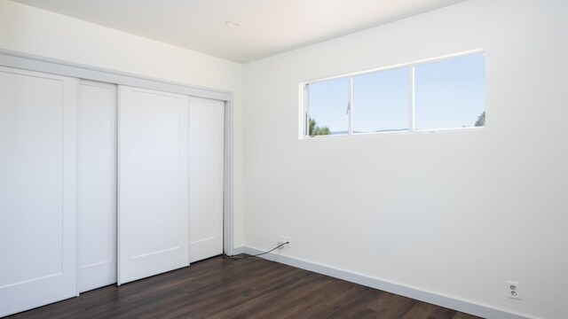 1311 Meadowvale Rd, Santa Ynez, CA 93460 - unfurnished bedroom featuring dark wood-style flooring, a closet, and baseboards