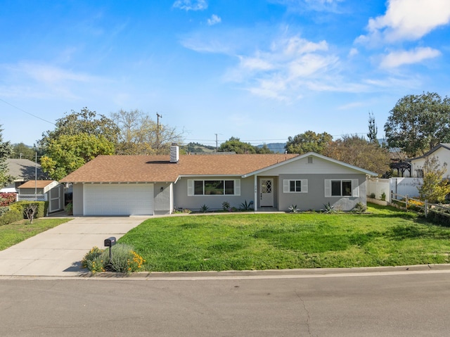 246 3rd St, Solvang, CA 93463 - ranch-style house featuring an attached garage, driveway, stucco siding, and a chimney