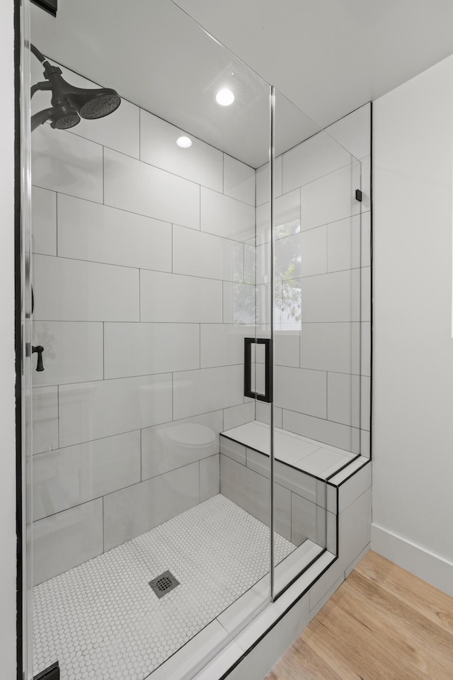 246 3rd St, Solvang, CA 93463 - bathroom featuring a shower stall, wood finished floors, baseboards, and recessed lighting