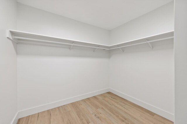 246 3rd St, Solvang, CA 93463 - spacious closet featuring light wood-style flooring