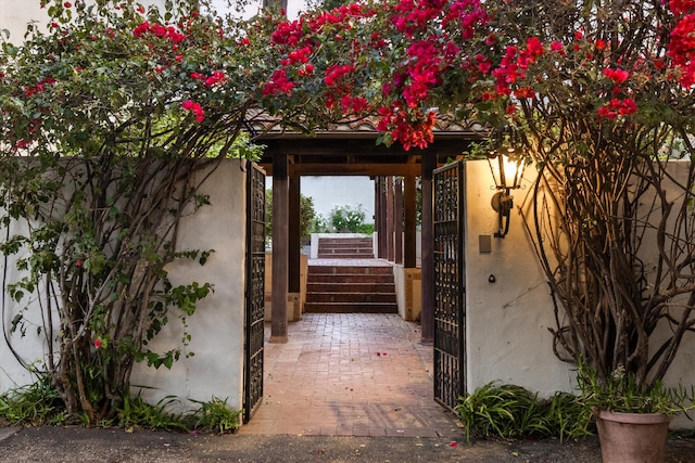 725 Ashley Rd, Montecito, CA 93108 - doorway to property featuring stucco siding and a gate