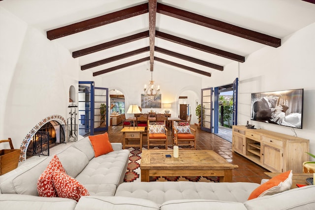725 Ashley Rd, Montecito, CA 93108 - living area with arched walkways, a chandelier, and a large fireplace