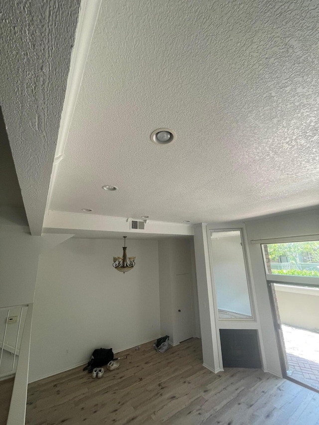 4305 Redwood Ave Unit 10, Los Angeles, CA 90292 - detailed view of a textured ceiling, wood finished floors, and a chandelier