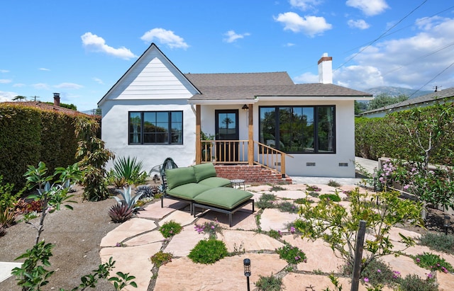 3018 Ventura Dr, Santa Barbara, CA 93105 - view of front of property featuring stucco siding, a chimney, roof with shingles, and a patio