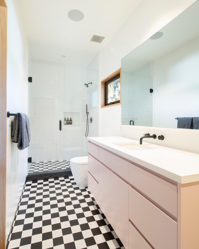 5399 Baseline Ave, Santa Ynez, CA 93460 - full bath with toilet, a shower stall, vanity, and tile patterned floors
