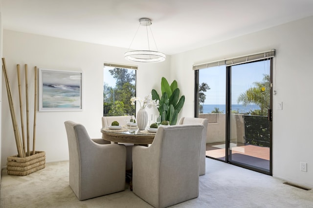 1649 Miramesa Dr, Santa Barbara, CA 93109 - carpeted dining space with a chandelier
