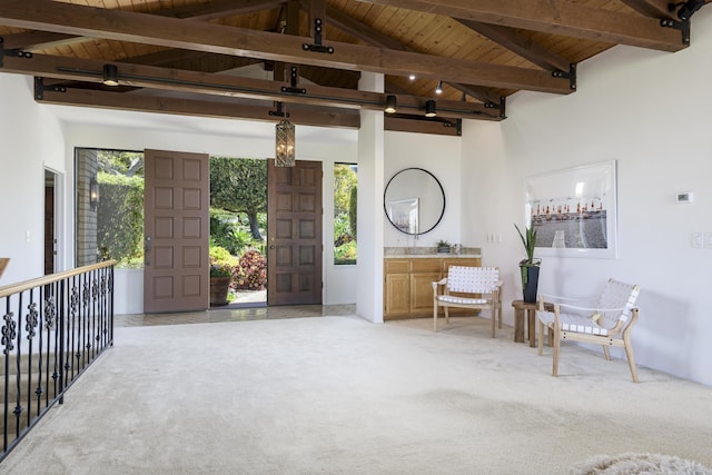 1649 Miramesa Dr, Santa Barbara, CA 93109 - living area featuring wooden ceiling and light colored carpet