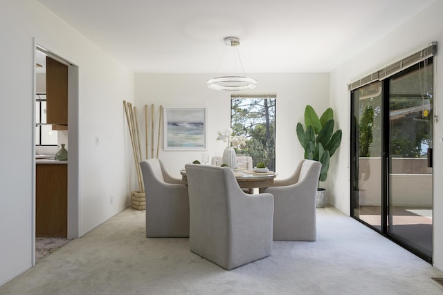 1649 Miramesa Dr, Santa Barbara, CA 93109 - dining area with carpet and a chandelier