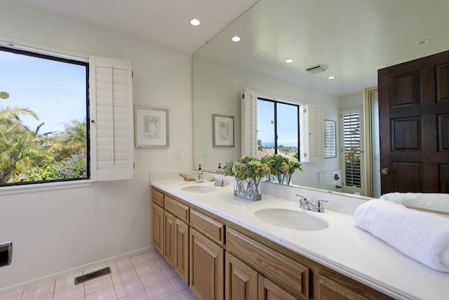 1649 Miramesa Dr, Santa Barbara, CA 93109 - bathroom featuring double vanity, tile patterned flooring, baseboards, and recessed lighting