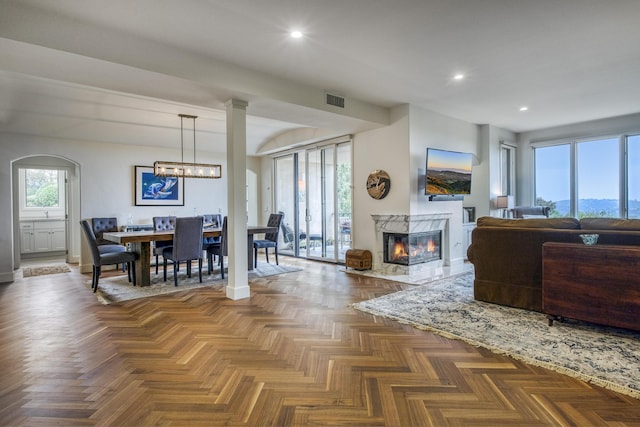 4477 Shadow Hills Blvd Unit A, Santa Barbara, CA 93105 - dining area with recessed lighting, a premium fireplace, a chandelier, and baseboards