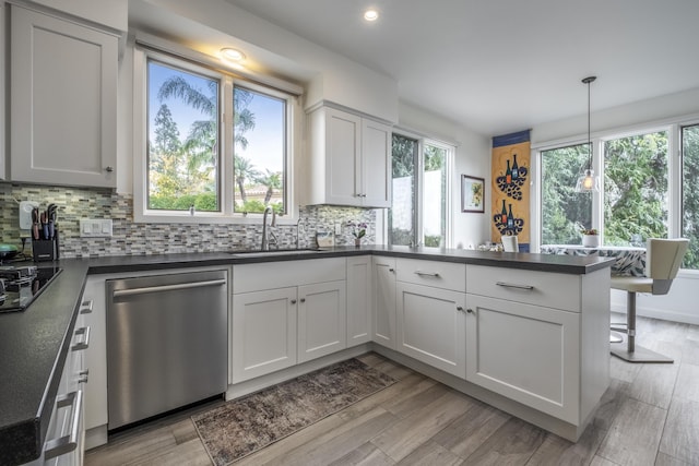 4477 Shadow Hills Blvd Unit A, Santa Barbara, CA 93105 - kitchen featuring dishwasher, a sink, dark countertops, a peninsula, and recessed lighting