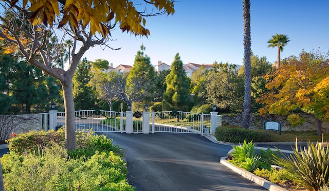 4477 Shadow Hills Blvd Unit A, Santa Barbara, CA 93105 - view of asphalt street featuring a gate, a gated entry, and curbs
